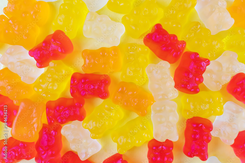 Jelly bears of different colors. The concept of junk sweets, candies. Minimalism, top view, flat lay, place for text. Jelly bears of different colors. The concept of junk sweets, candies. Minimalism, top view, flat lay, place for text.