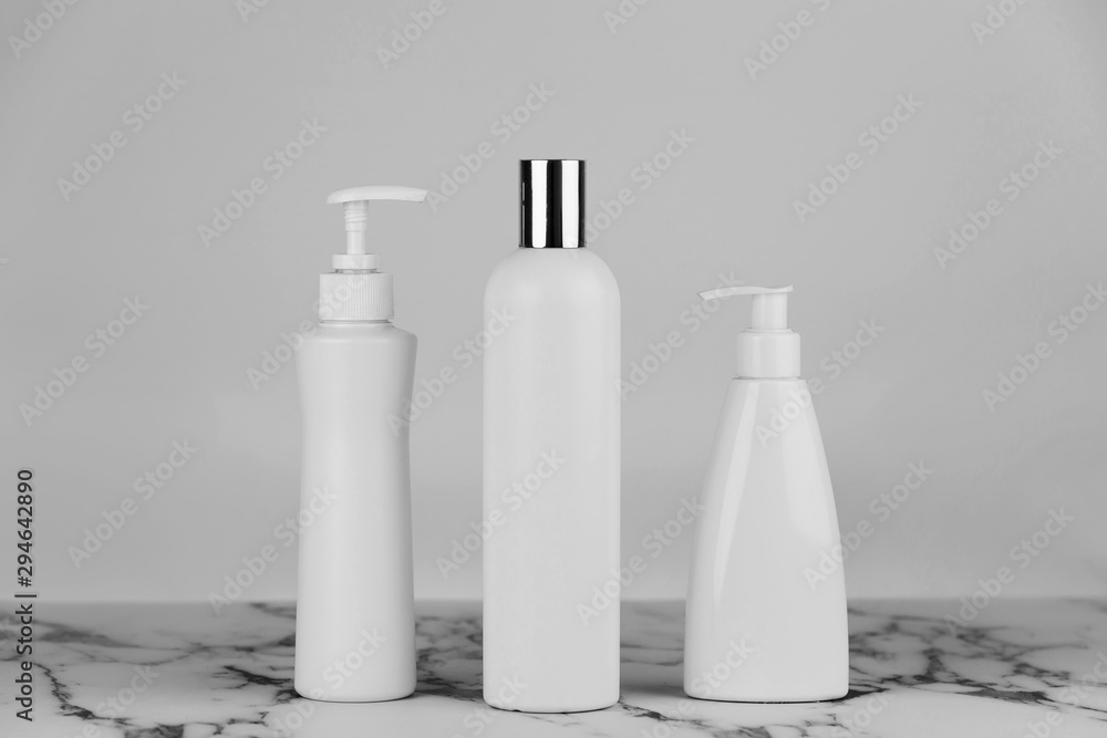 Set of cosmetic bottles, collection empty white bottles of cream with dispenser, shampoo or lotion on white background Set of cosmetic bottles, collection empty white bottles of cream with dispenser, shampoo or lotion on white background