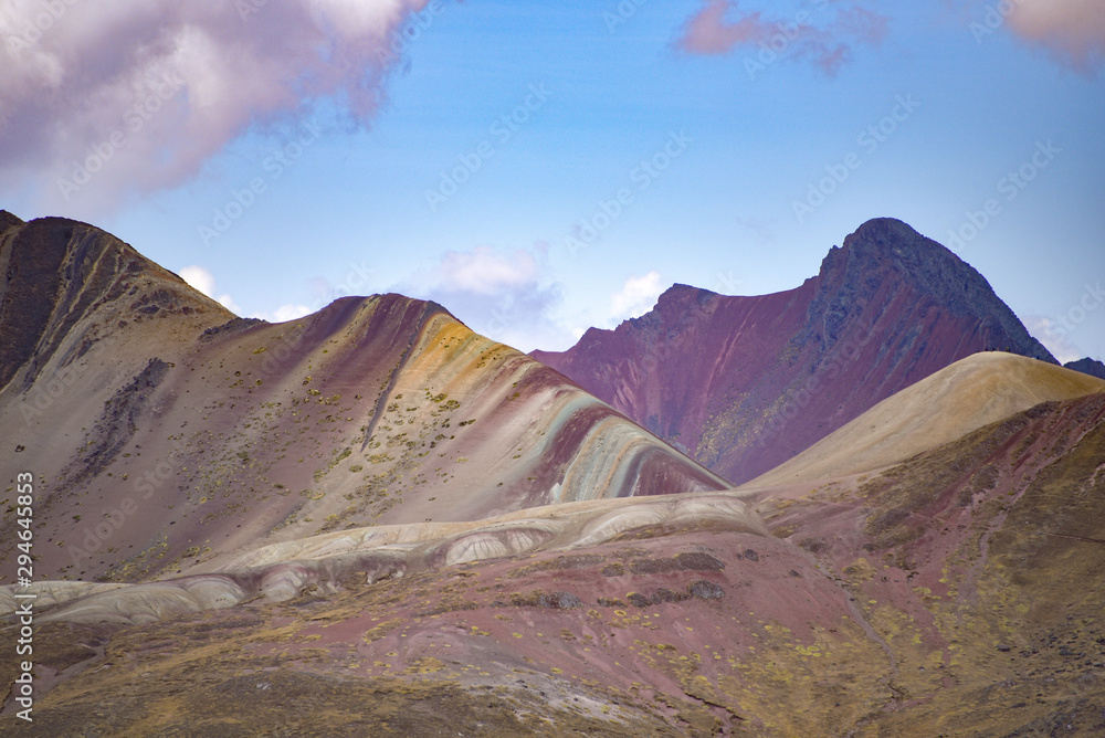 Views of the Vinicuna 'rainbow mountain' from a distance. Cordillera Vilcanota, Cusco, Peru