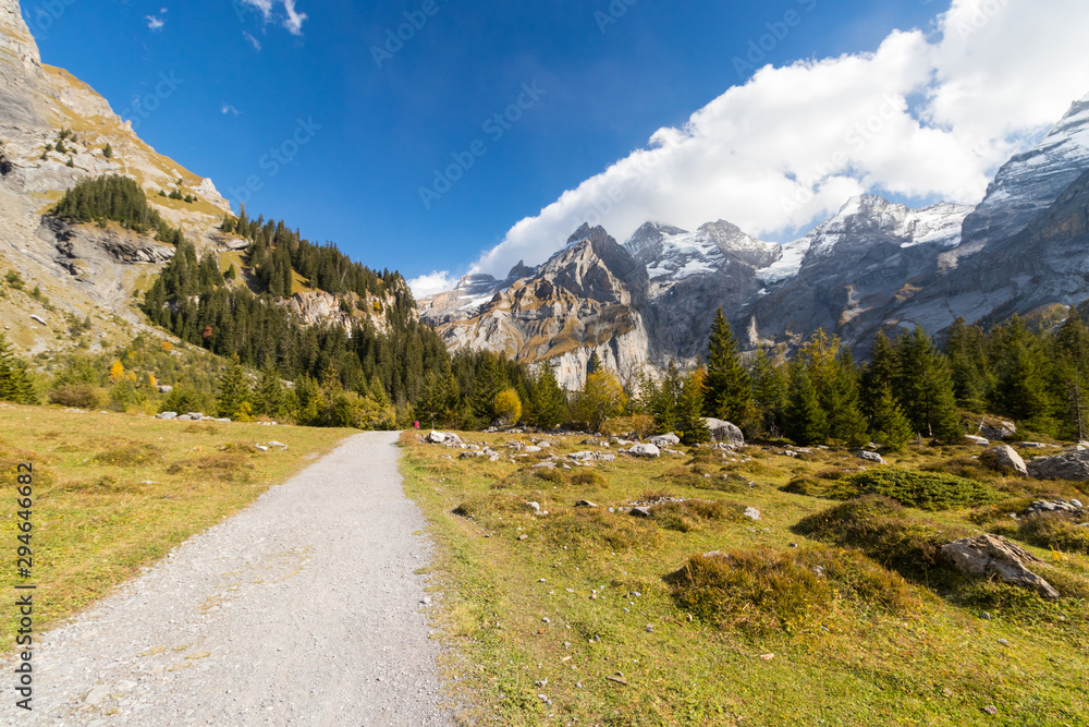 Kandersteg valley with green grass and mountain in Switzerland, natural background