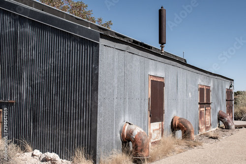 Canvas Print Old metal building with rust