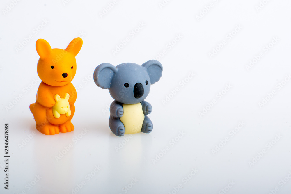 Koala and kangaroo rubber toys, cute animal shaped rubber doll isolated in white background. Koala and kangaroo rubber toys, cute animal shaped rubber doll isolated in white background.