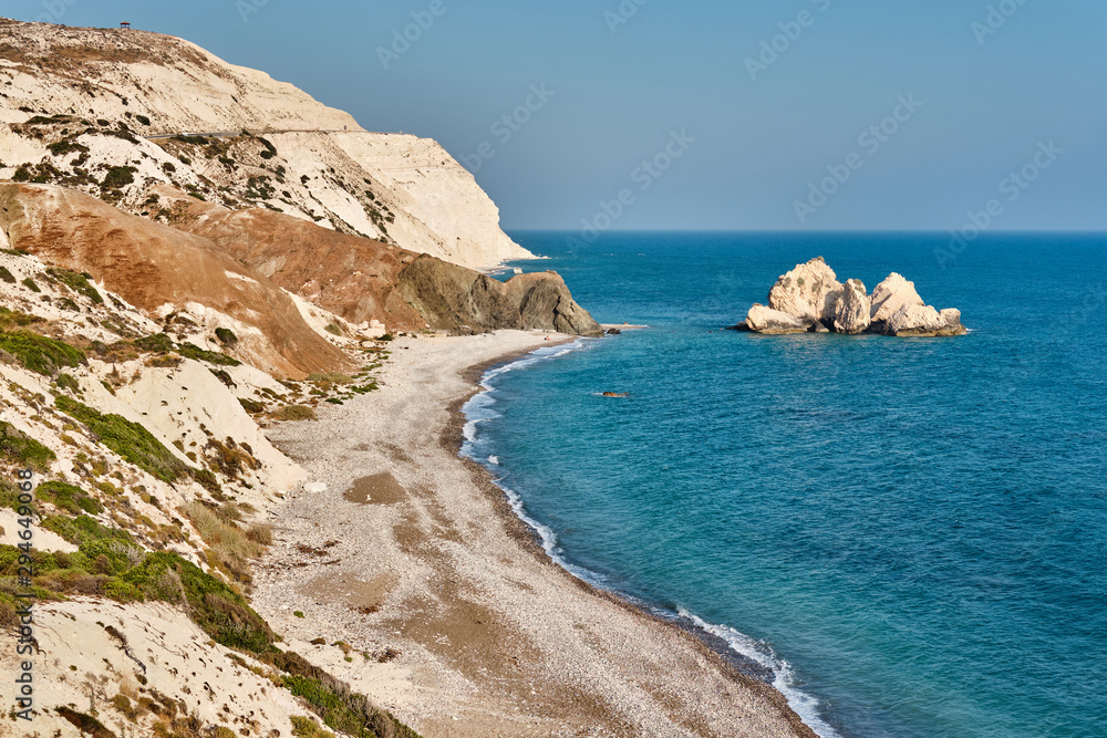 Shot of the coast of Aphrodite's birthplace near Paphos city, Cyprus. A popular holiday destination. Tourism, vacation, traveling, leisure concept.