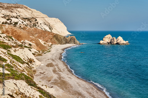 Shot of the coast of Aphrodite's birthplace near Paphos city, Cyprus. A popular holiday destination. Tourism, vacation, traveling, leisure concept.