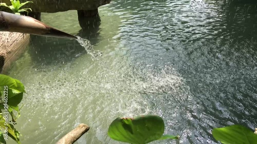 Beautiful artificial waterfall in the garden