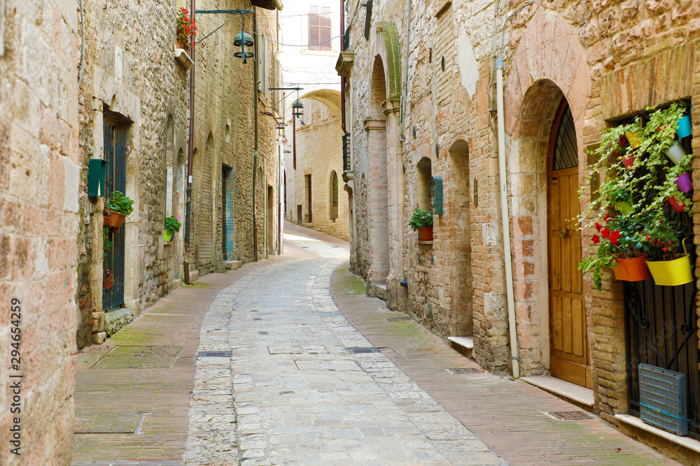 Beautiful Italian old city. Typical medieval architecture on cozy street in the heart of Italy.