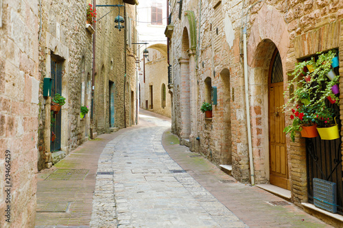 Beautiful Italian old city. Typical medieval architecture on cozy street in the heart of Italy. © zigres