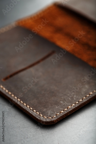 Open Dark Brown Leather Passport Cover. Genuine leather, handmade. photo