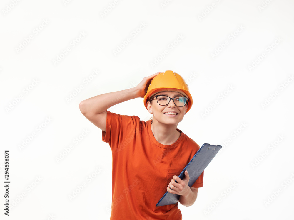 beautiful foreman girl in a yellow helmet with a blue folder on a white background beautiful foreman girl in a yellow helmet with a blue folder on a white background