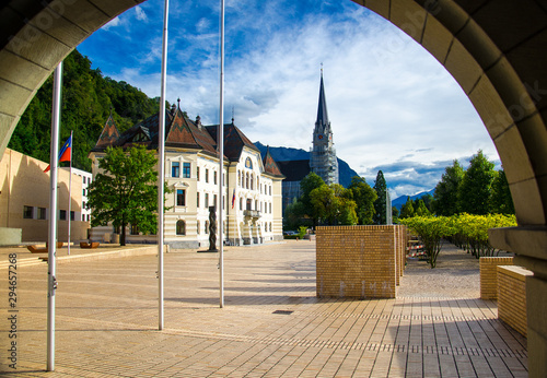 Vaduz, Liechtenstein - September 15, 2016: Old building of parliament and Cathedral of St. Florin