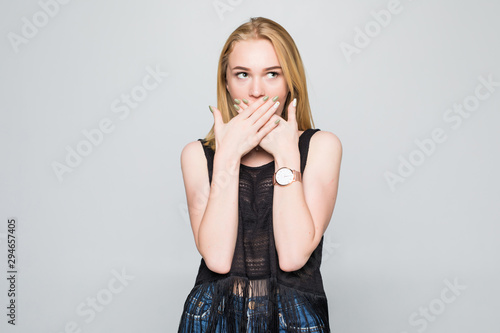 Happy surprised excited woman covering with hands her mouth