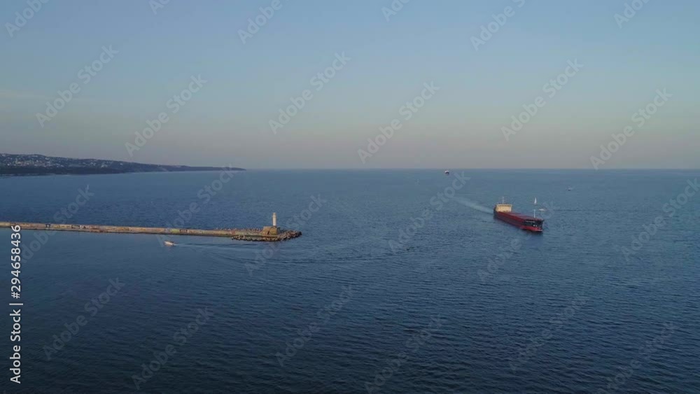 Aerial view of container cargo ship in import or export business logistic and transportation of international products. Container cargo ship in the open sea. Container Ship Vessel. Aerial view of container cargo ship in import or export business logistic and transportation of international products. Container cargo ship in the open sea. Container Ship Vessel.