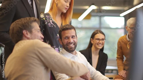 Young business people shake hands in the office for agreement success concept 