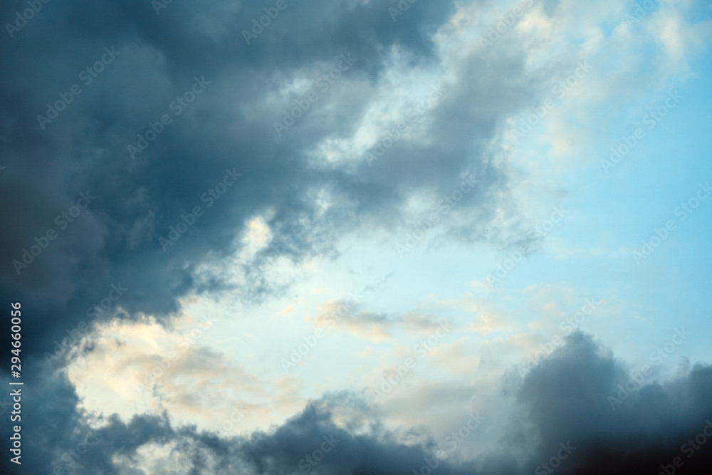 Obraz premium The texture of the beautiful blue sky with white clouds.