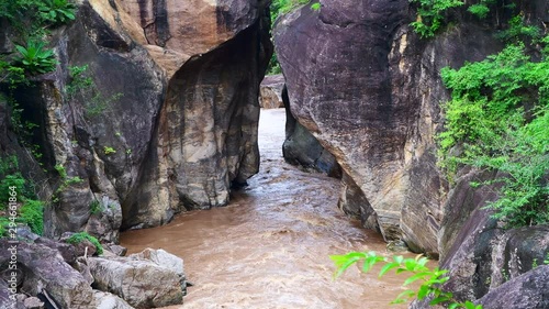 4K video of water flowing in Obluang national park, Thailand. photo