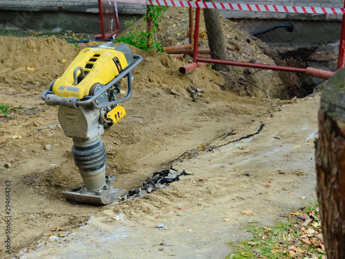 Special construction machinery, gasoline rammer, vibratory hammer, jumping jack machine, at construction site