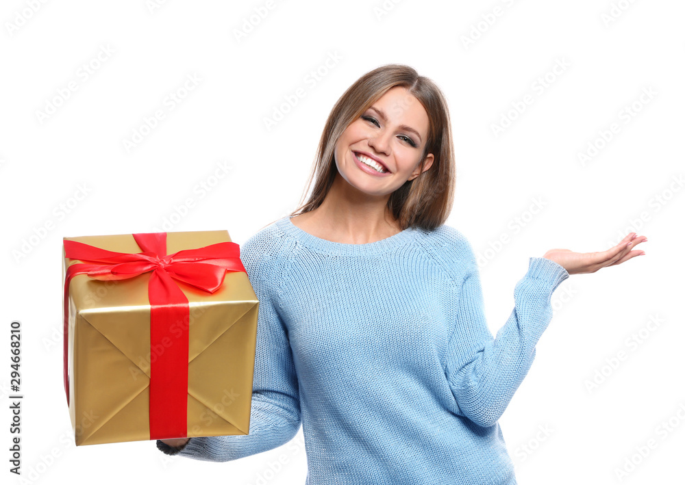Young woman with Christmas gift on white background Young woman with Christmas gift on white background