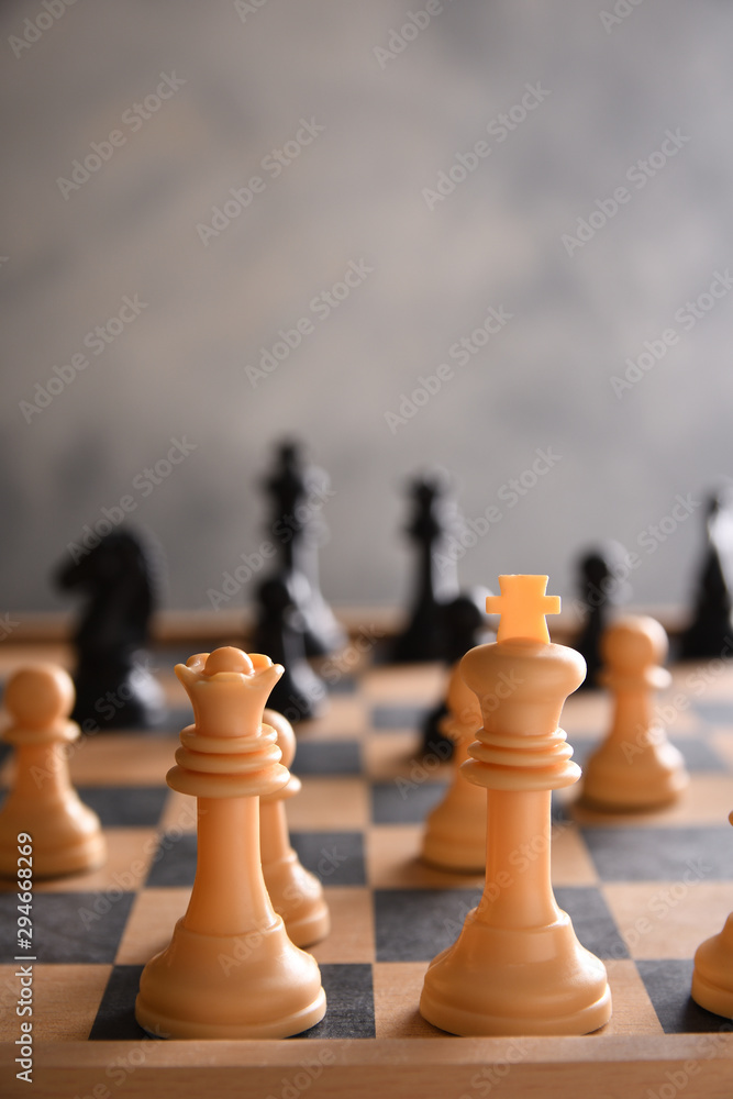 board game for ideas and strategy, business success concept. hand of businessman man moving chess figure in competition success play.  strategy, management or leadership concept.playing photographed 