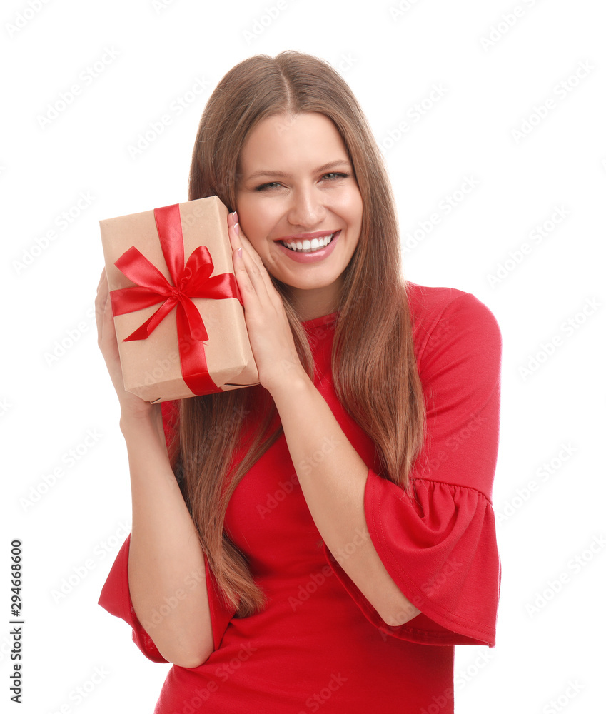 Happy young woman with Christmas gift on white background Happy young woman with Christmas gift on white background