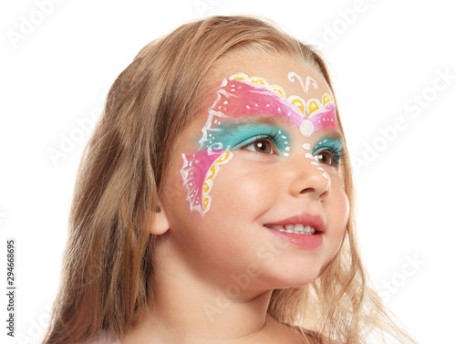 Cute little girl with face painting on white background