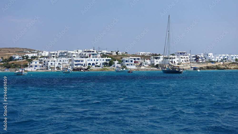 Photo of famous sandy turquoise beach of Ammos near main port of Koufonisi island, Small Cyclades, Greece