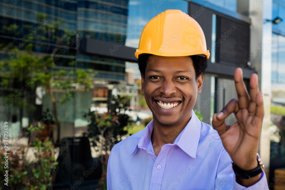 Portrait of Afro american architect in hard hat Portrait of Afro american architect in hard hat