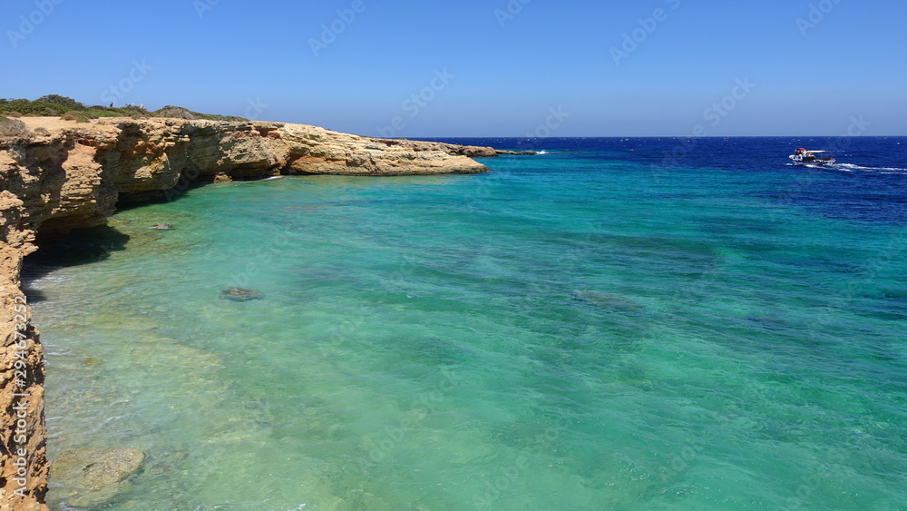 Beautiful turquoise rocky seascape in iconic island of Koufonisi, Small Cyclades, Greece