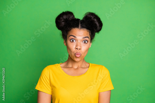 Closeup photo of amazing dark skin lady can't say word make ducky lips facial expression very shy person wear yellow t-shirt isolated green background