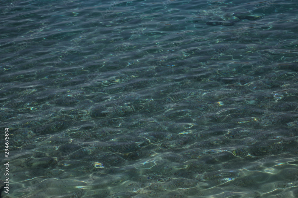 Obraz premium water ripples and reflections-Mediterranean sea, Peloponnese coast, southern Greece