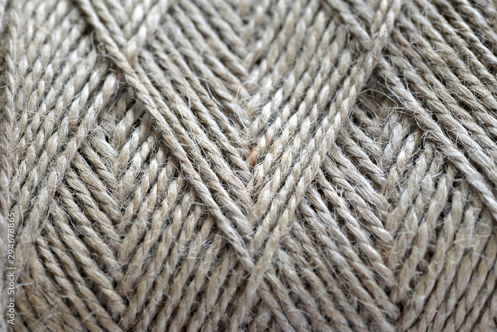 Top view of natural jute twine skein background, macro Top view of natural jute twine skein background, macro