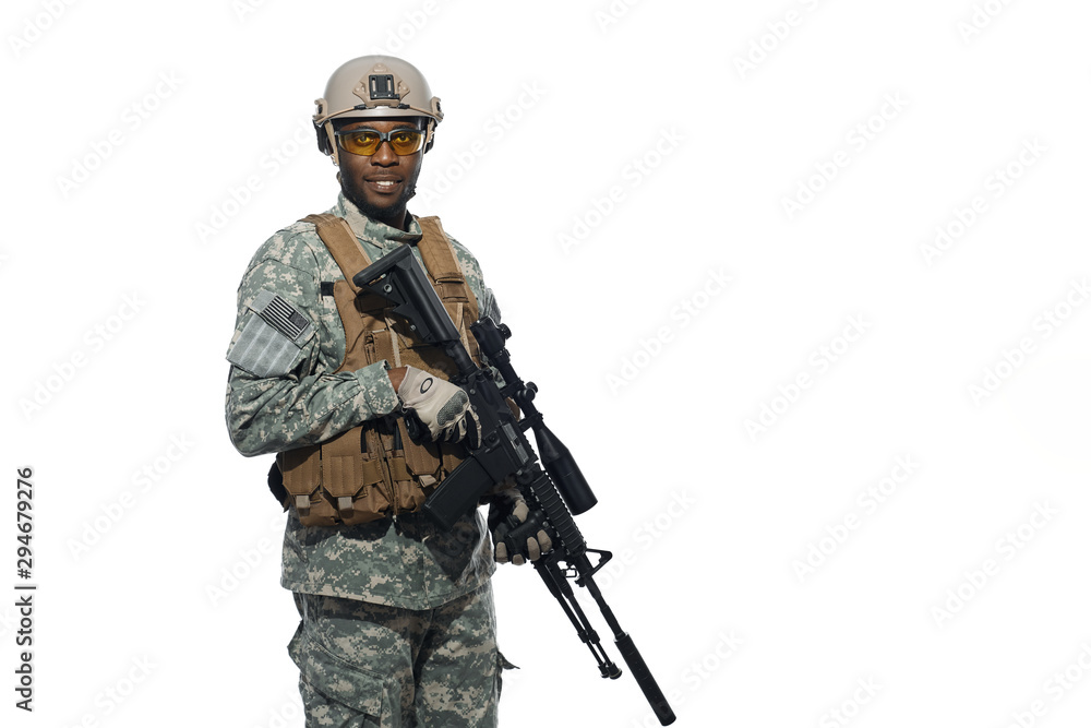Young soldier wearing Americans army uniform and glasses.