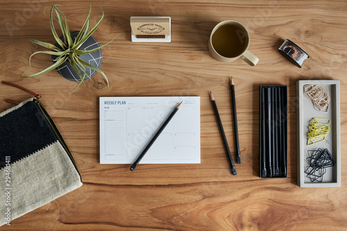 Overhead still life of well organized desk photo