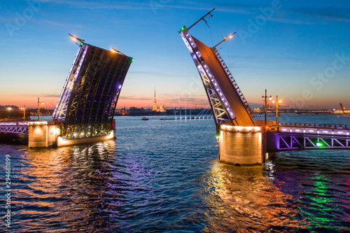 White nights in Saint-Petersburg - the opening of the Palace drawbridge, a view of the Peter and Paul Cathedral