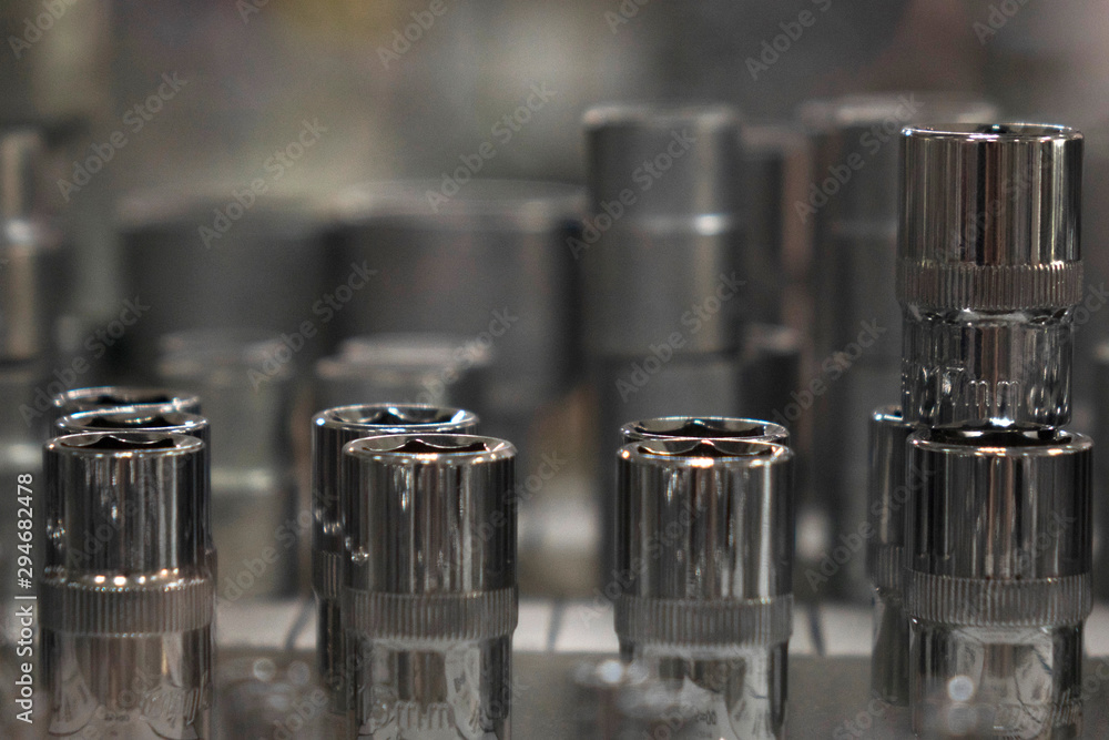 Set of chrome spanners and metal bits close-up . Set of chrome spanners and metal bits close-up .