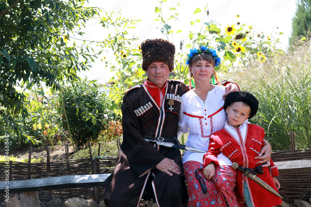 Obraz premium Family in Cossack costumes