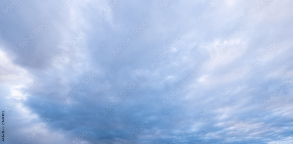 blue sky is covered by white clouds