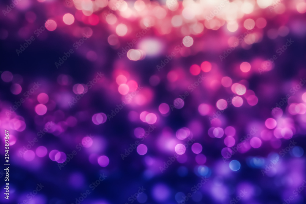 Abstract holiday background with multicolored defocused lights Abstract holiday background with multicolored defocused lights