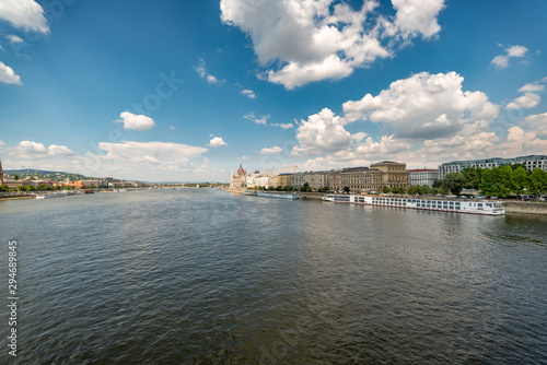 Wide angle view from the Szechenyi Chain Bridge towards Budapest parliament building