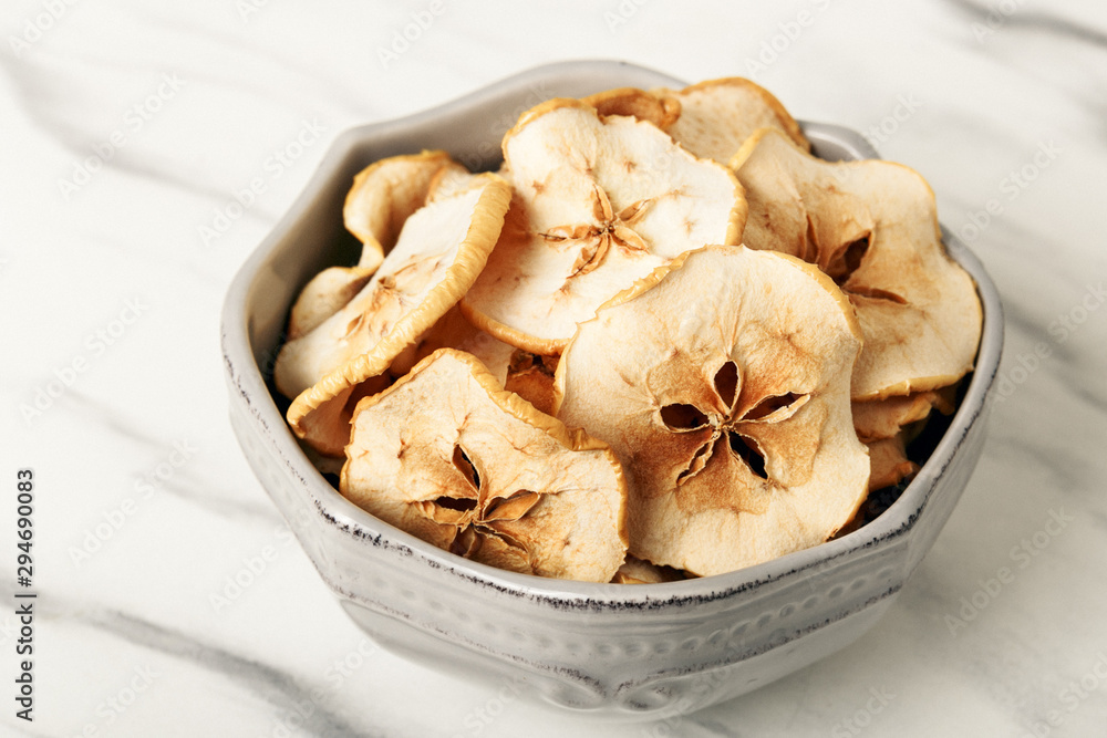 Bowl of Healthy Snack from fruit Chips, dried apple Bowl of Healthy Snack from fruit Chips, dried apple