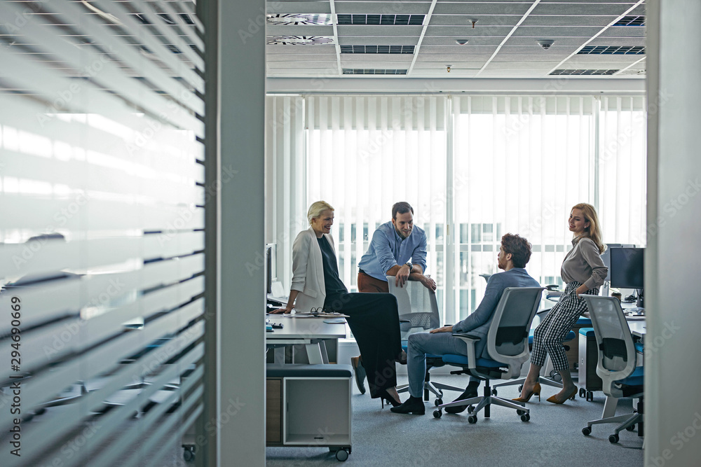 © Lumina/Stocksy - Group of Businesspeople Having a Meeting