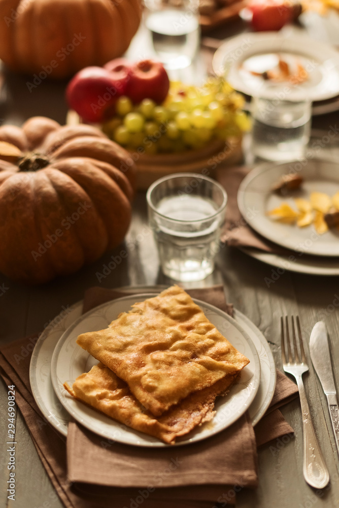 Pumpkin pie on a festive autumn table