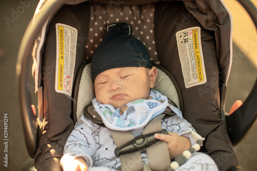 Konstfotografi Cute little baby sleeping in infant car seat