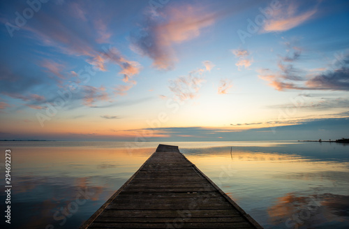 wooden pier in the sunset