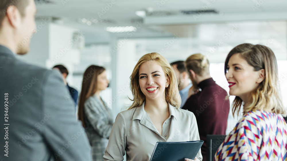 Businesspeople Talking at Work Businesspeople Talking at Work