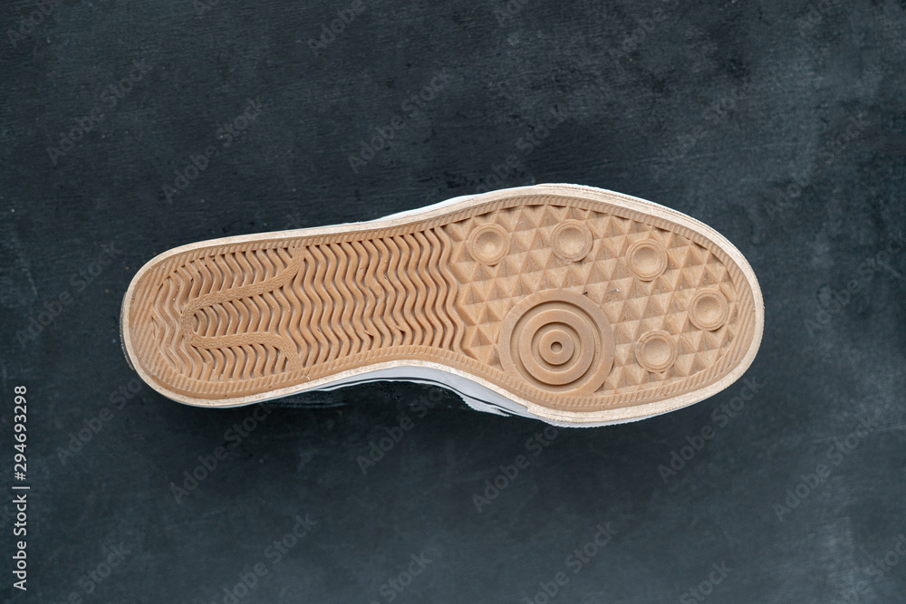 dirty and dusty used sneaker shoe sole, the bottom parts dirty and dusty used sneaker shoe sole, the bottom parts