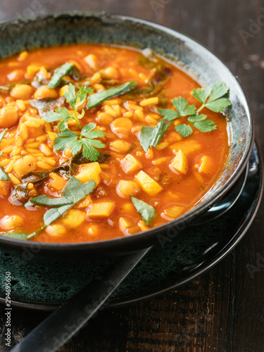 Tomato, Chickpea Soup with Malabar Spinach