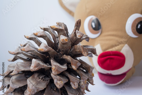 Christmas deer and pine cone