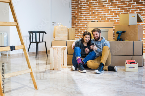 Young couple moving in a new home photo