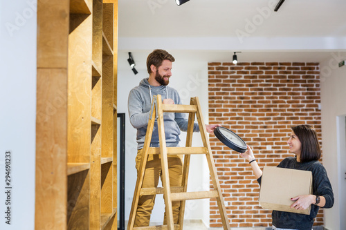 Young couple moving in a new home