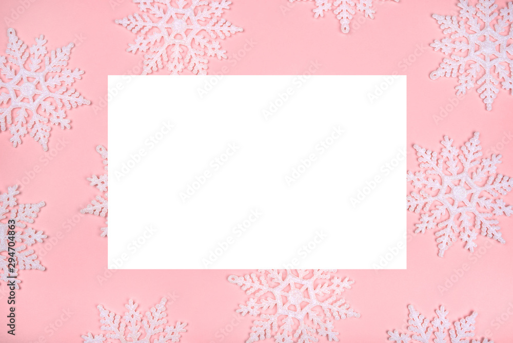 Winter pattern made of snowflakes and on pink background. Winter pattern made of snowflakes and on pink background.